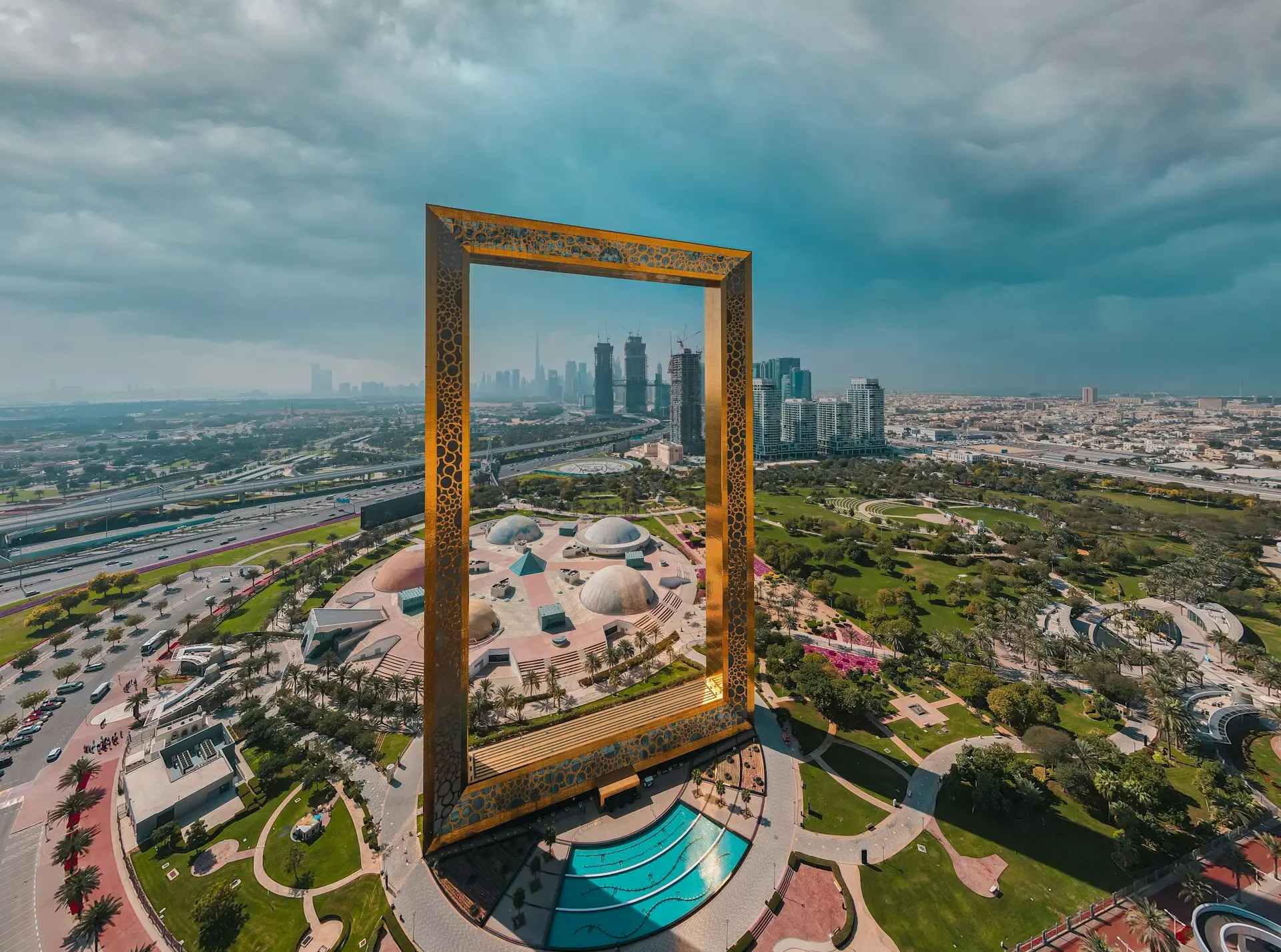 brown wooden framed mirror on top of a building