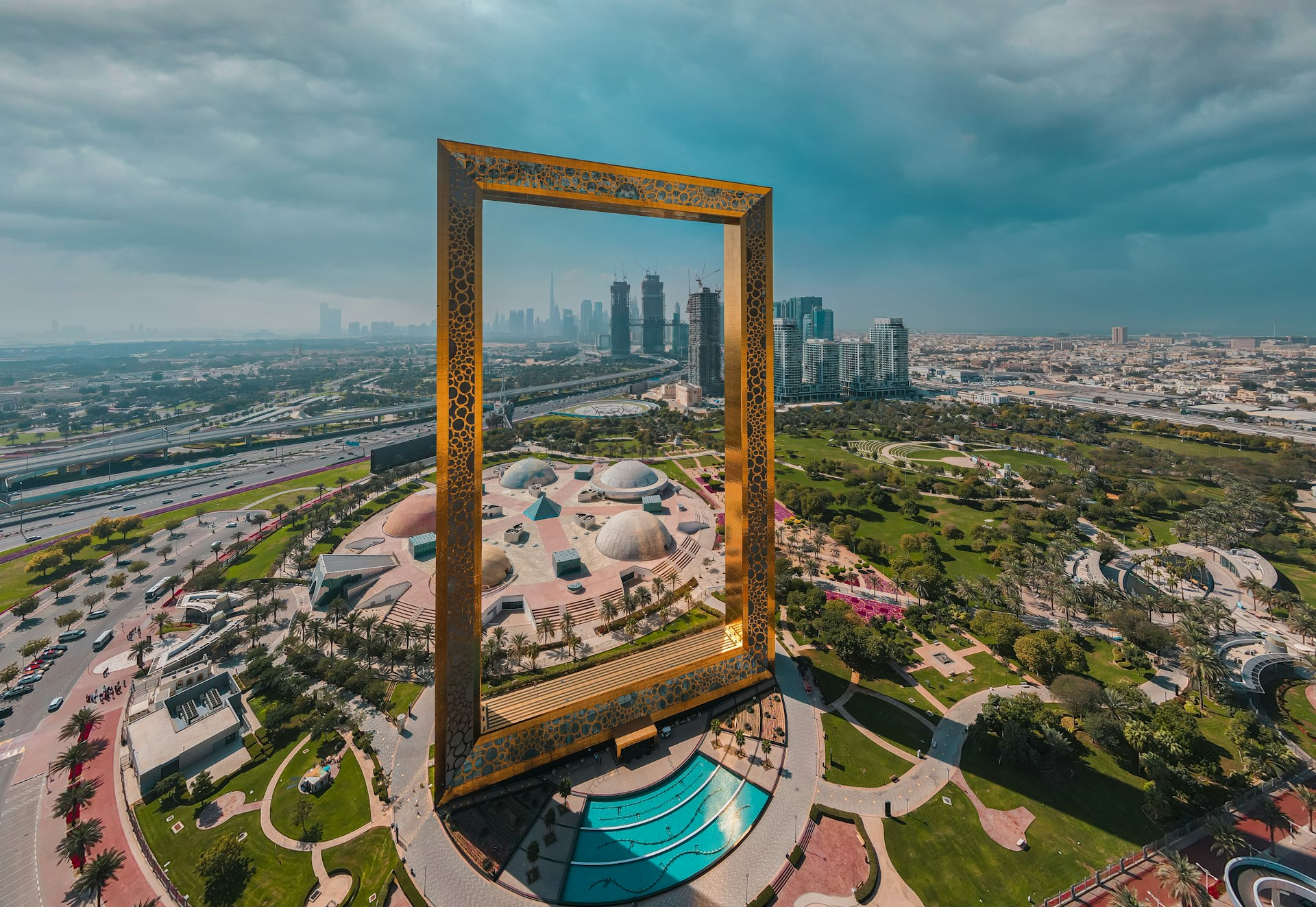brown wooden framed mirror on top of a building